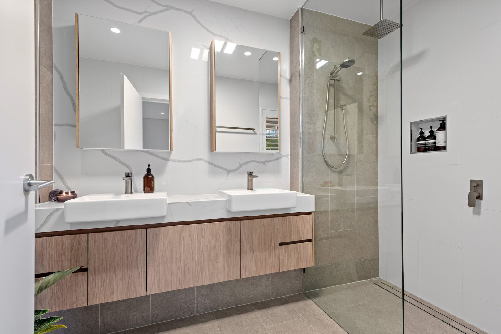 Modern bathroom design at Warilda Street Terraces with elegant fixtures and neutral tones