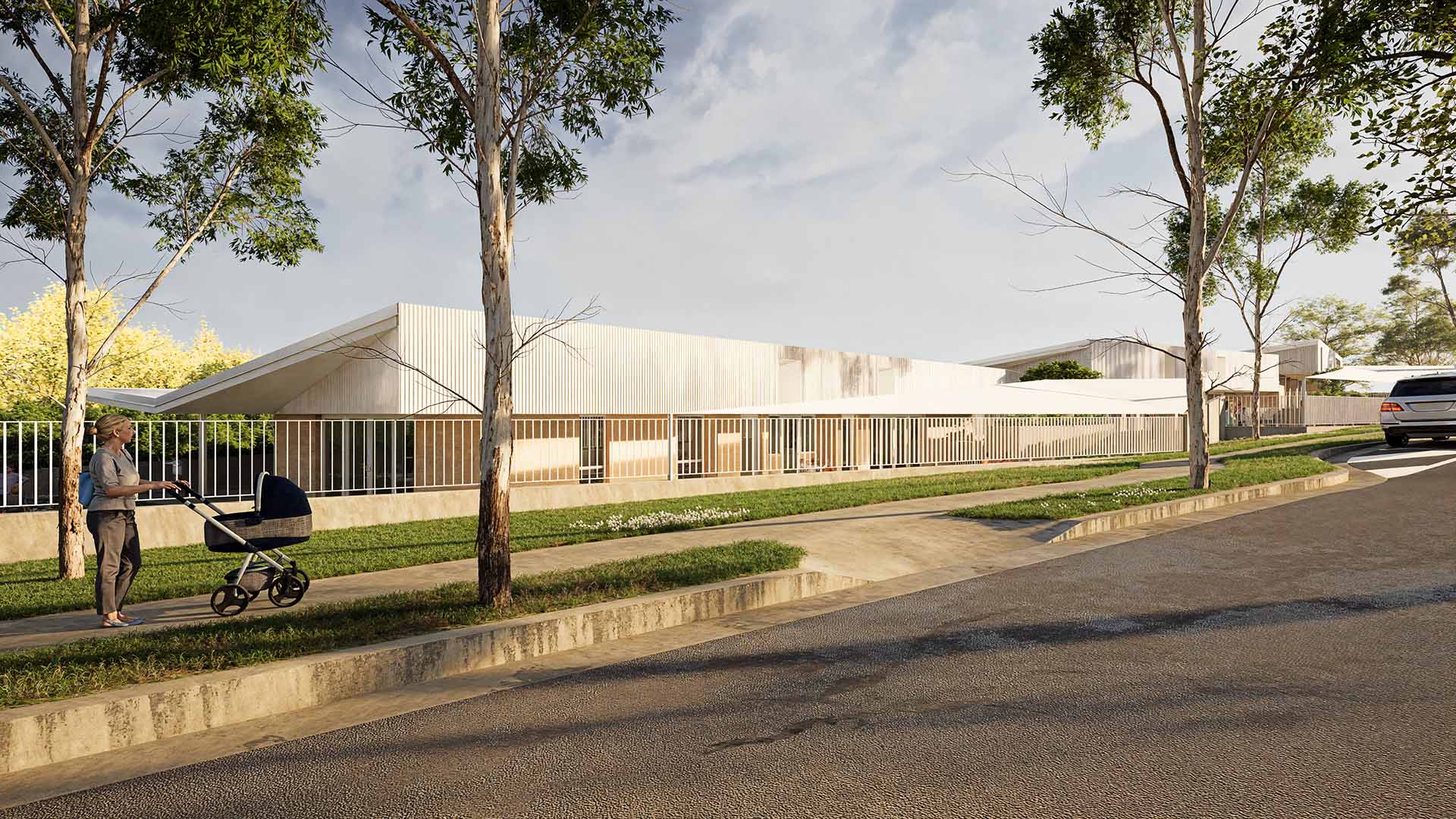 Exterior view of the Canterbury College ELC, showing relationship to street and surrounding greenery.