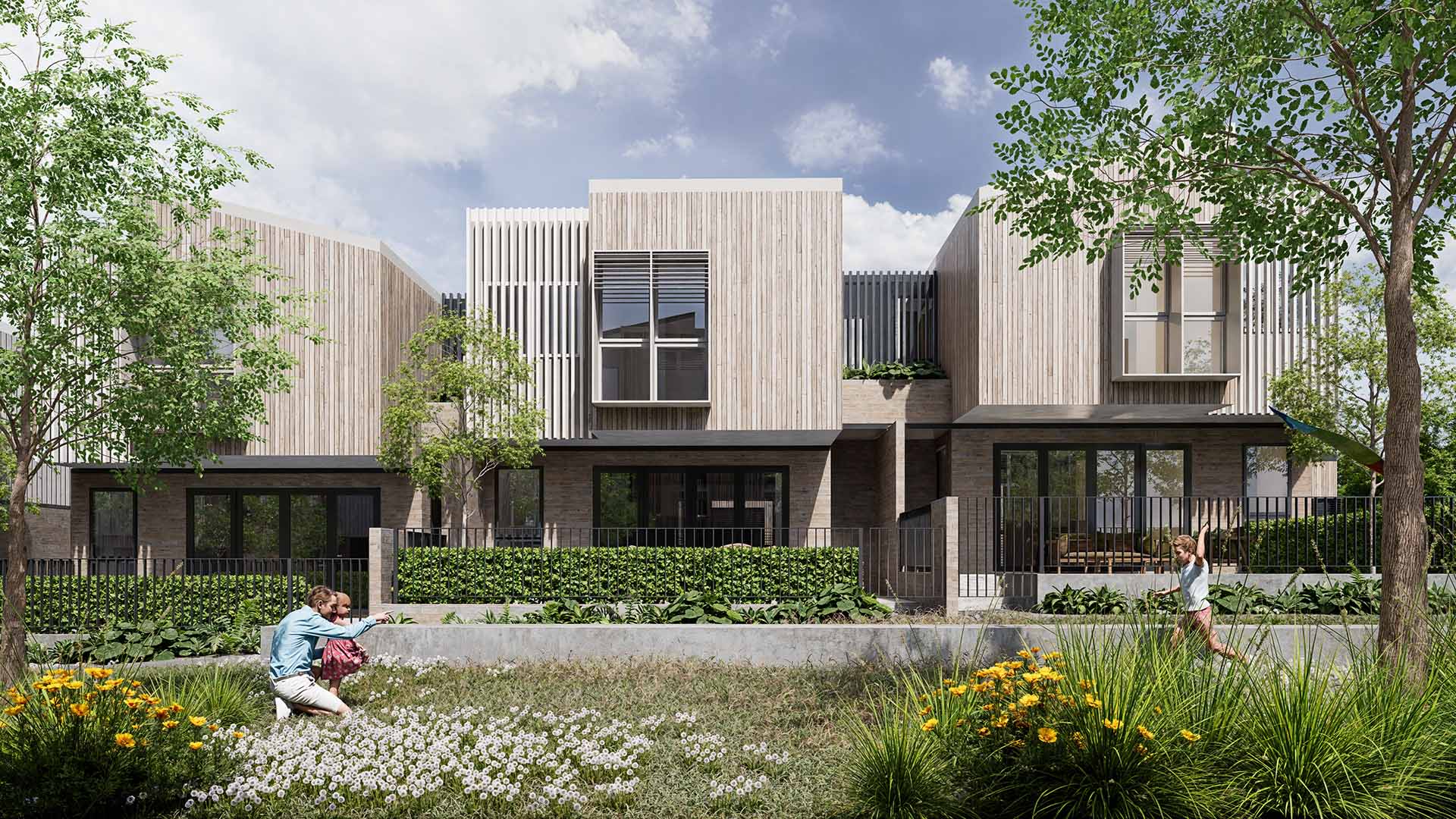 Townhome facade composition showing individual entry expression and roofline articulation